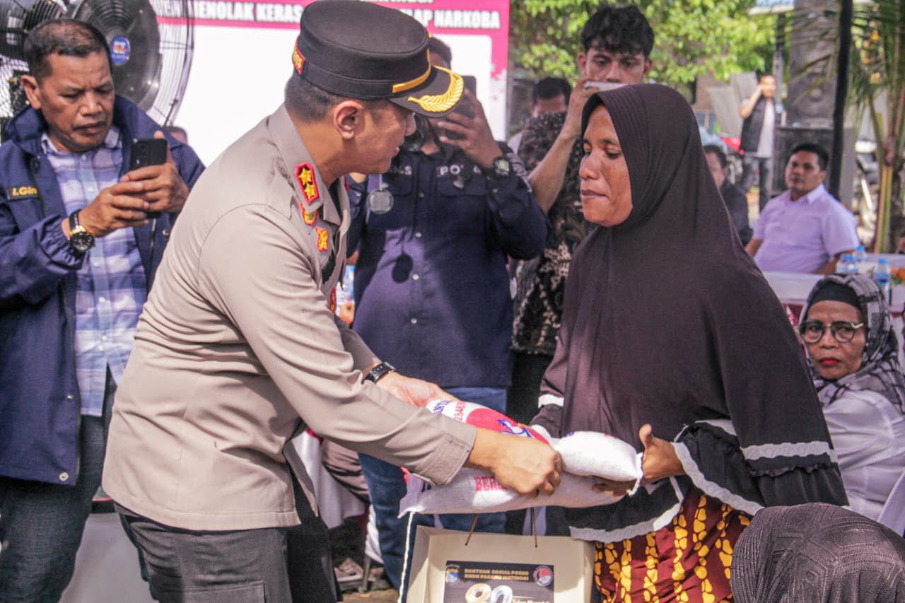 Kapolres Labuhanbatu Rangkul Warga Dan Anak Yatim di Posko Kampung Bebas Dari Narkoba Padang Matinggi